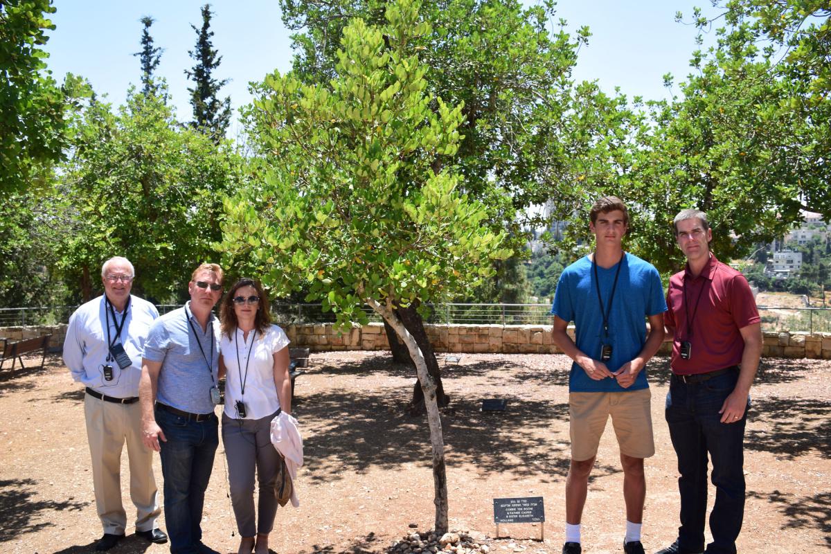 24 June, US Representative of the Christian Friends of Yad Vashem Rev. Mark Jenkins, along with Brian Autry and his son Mark, and Brandon and Wendy Pickett visited the tree planted in honor of Dutch Righteous Among the Nations Corrie Ten Boom.